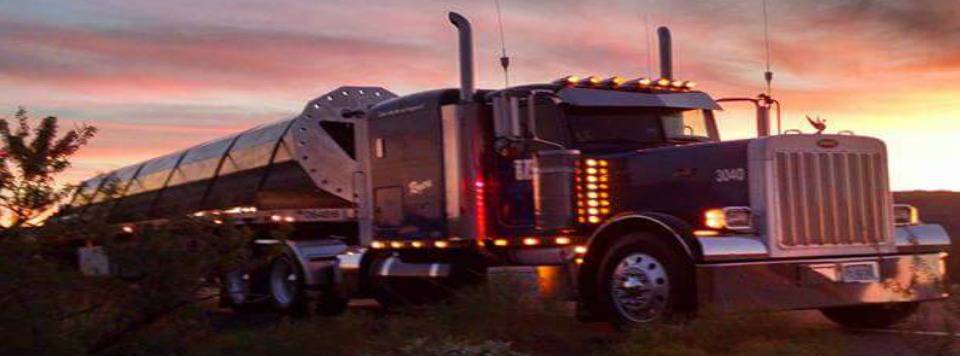Beautiful photo of a parked BTI Tractor at dusk.